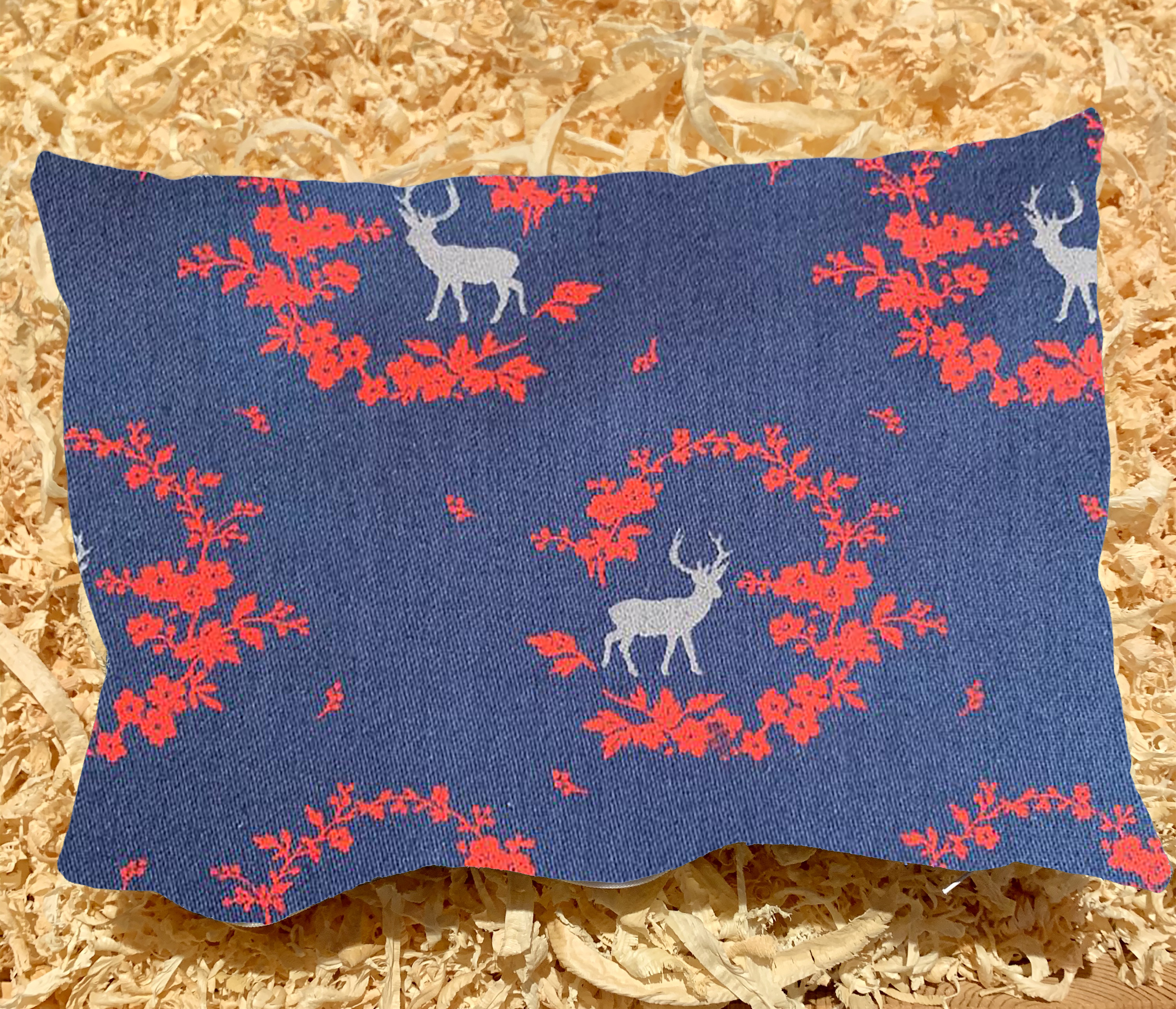 Cushion in blue pine with white deer