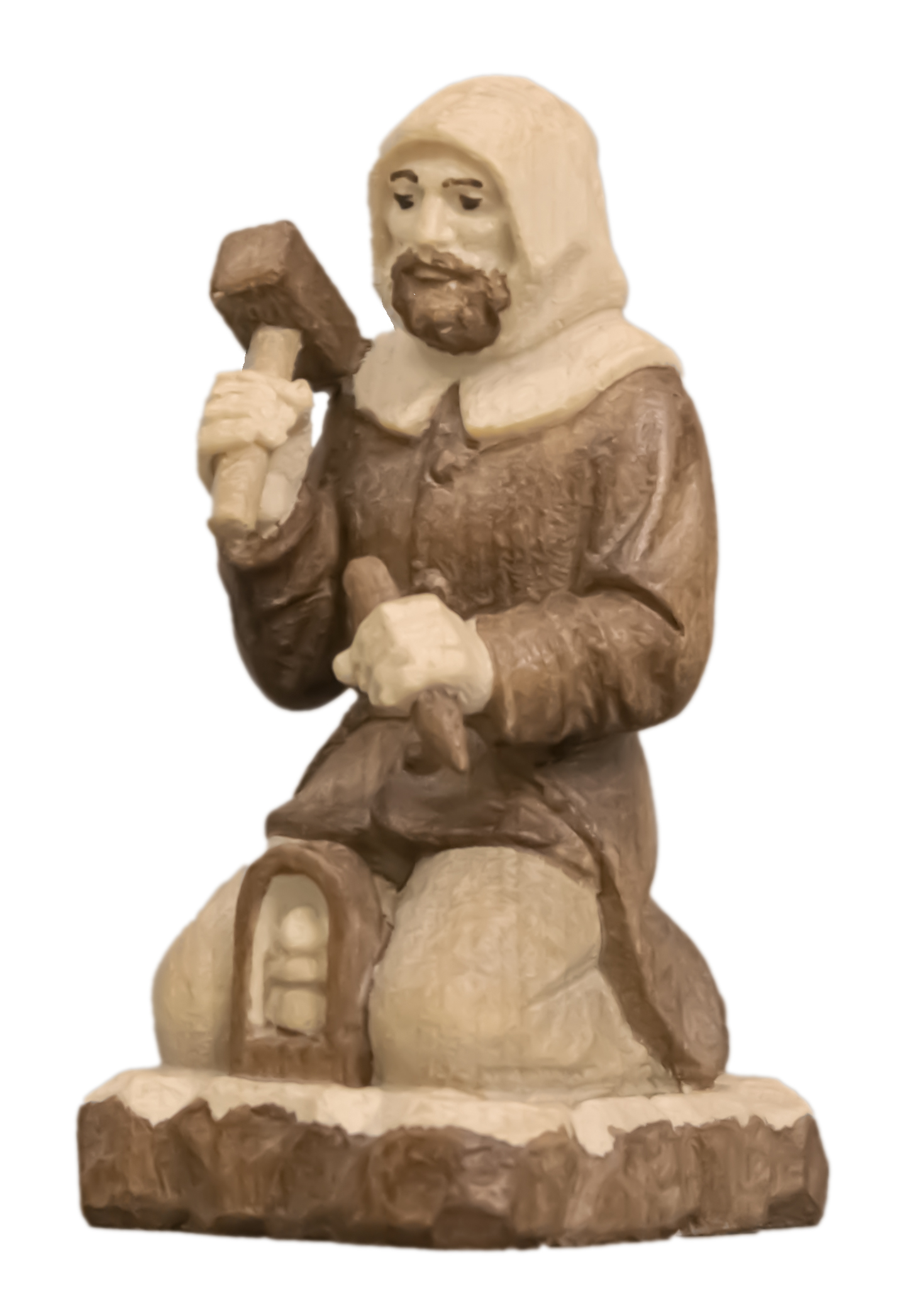 Berghäuer kniend mit Hammer und Meisel