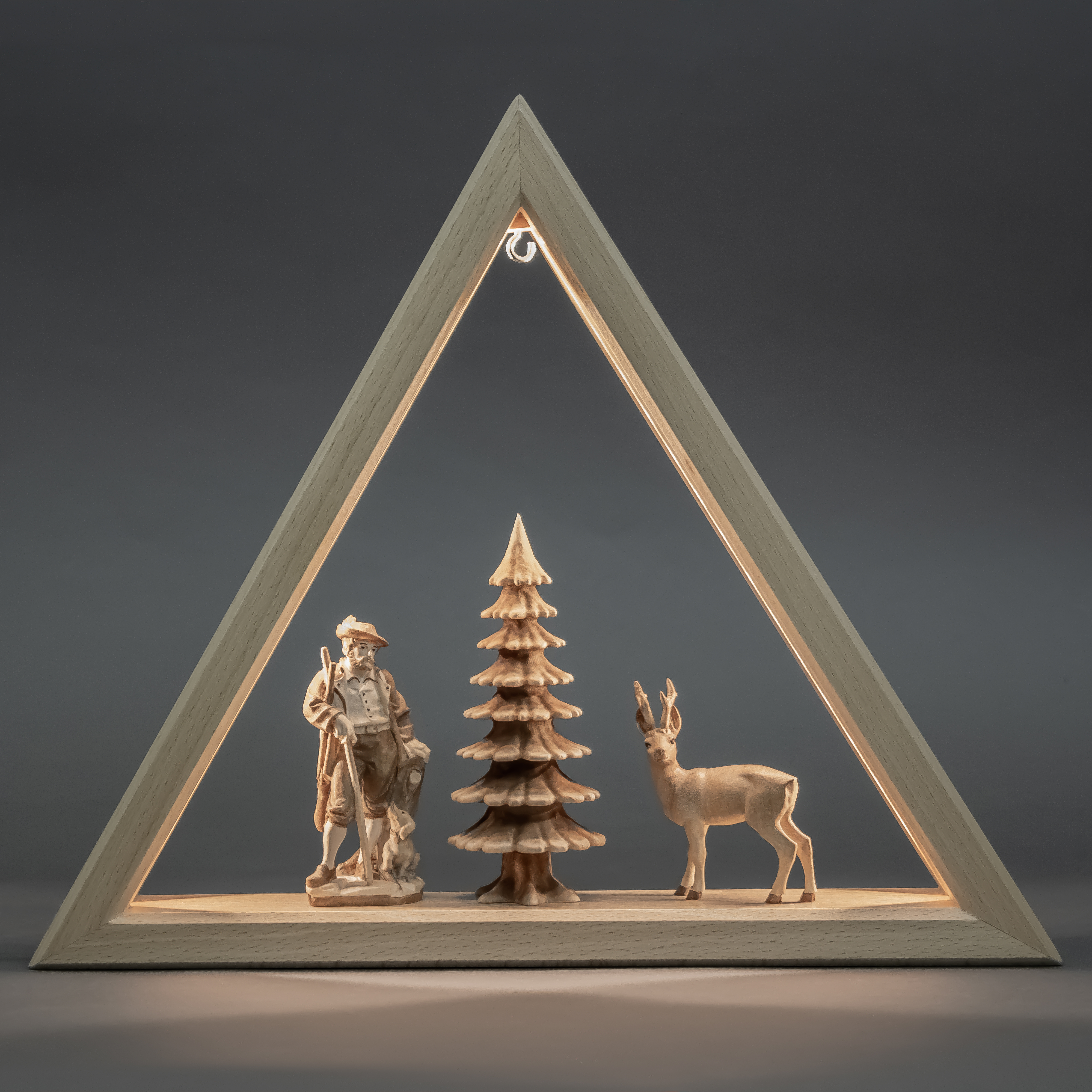 Beleuchtetes Dreieck mit Waldmotive